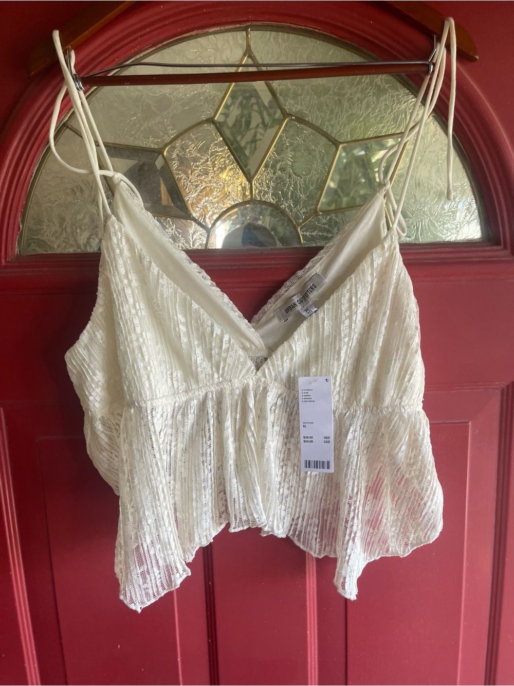 Urban Outfitters Ivory Textured Peplum Cami